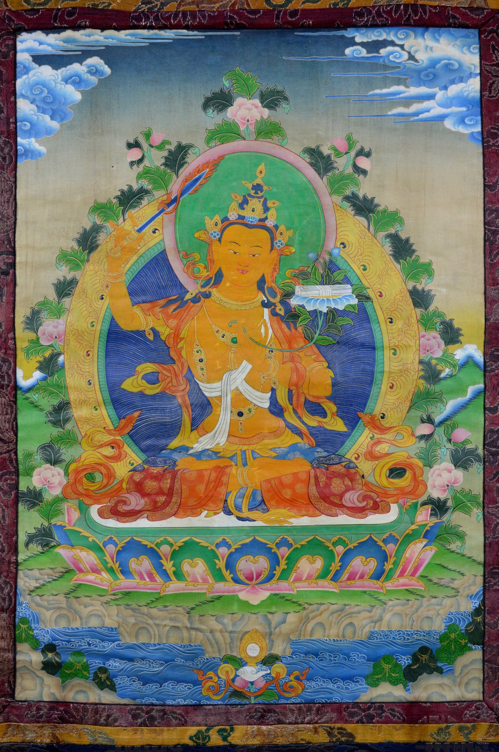 Tibetan Thangka depicting the Buddhist deity, Manjushri – 19th or 20th Century